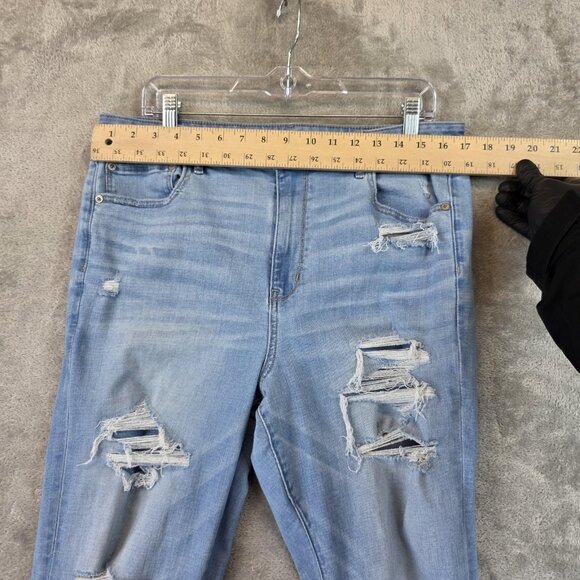 American Eagle Jeans Womens 16 Light Wash Distressed Flare Raw Hem Stretch Rips - Picture 2 of 12